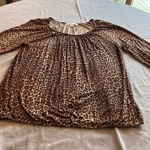 Michael Kors animal print blouse size L. Elastic at the sleeves and bottom